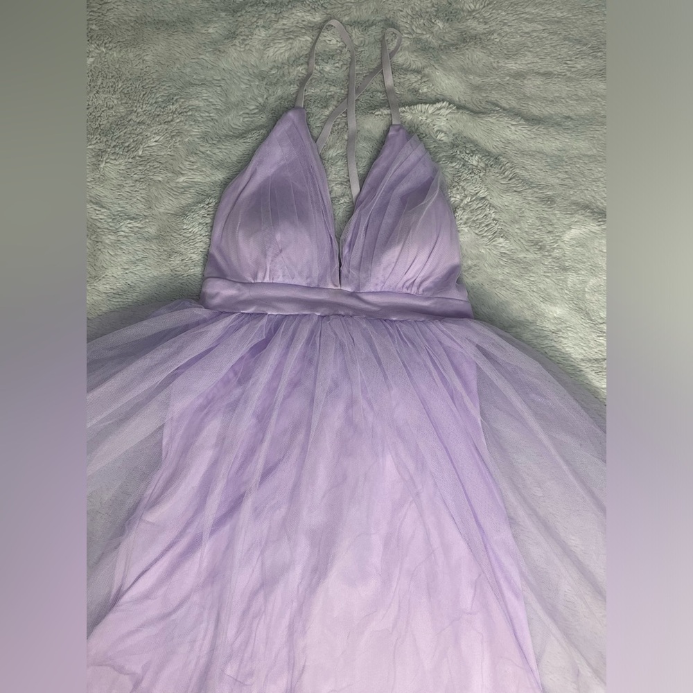 A lavender cross back tulle dress